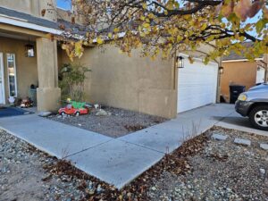 The exterior of a house showcasing new outdoor lighting fixtures installed by Calhoun Electric Inc. in Rio Rancho, NM