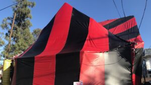 A close-up view of a house covered for termite fumigation by Intensive Pest Control in Long Beach, CA.