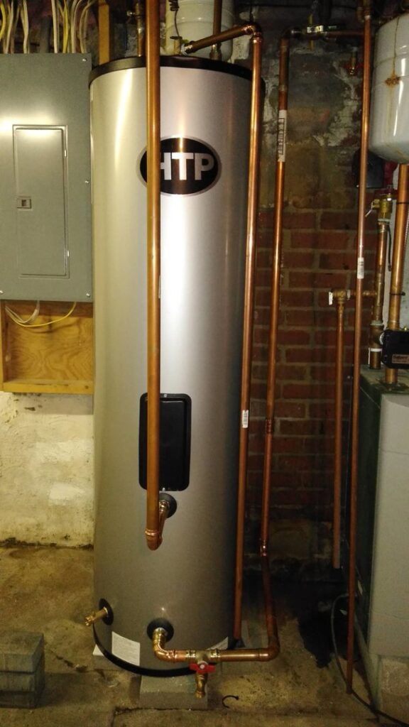 An HTP water heater with new copper piping and electrical connections, installed by MBI Heating and Air Conditioning in Allentown, PA.