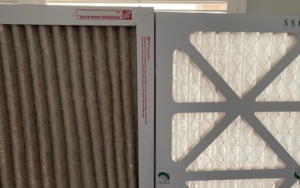 A dirty HVAC air filter next to a clean new one, showing the need for replacement by Carolina HVAC Services in Lancaster, SC