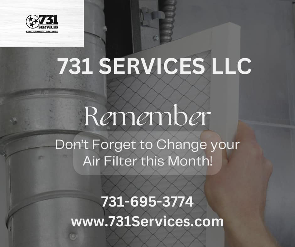 A hand changing an HVAC air filter, a key maintenance service offered by 731 Services LLC in Jackson, TN