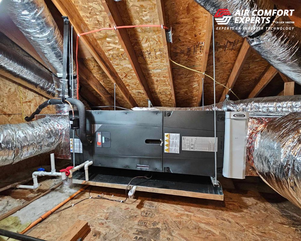 An HVAC air handler unit and ductwork installed in an attic by Air Comfort Experts in Pasadena, CA