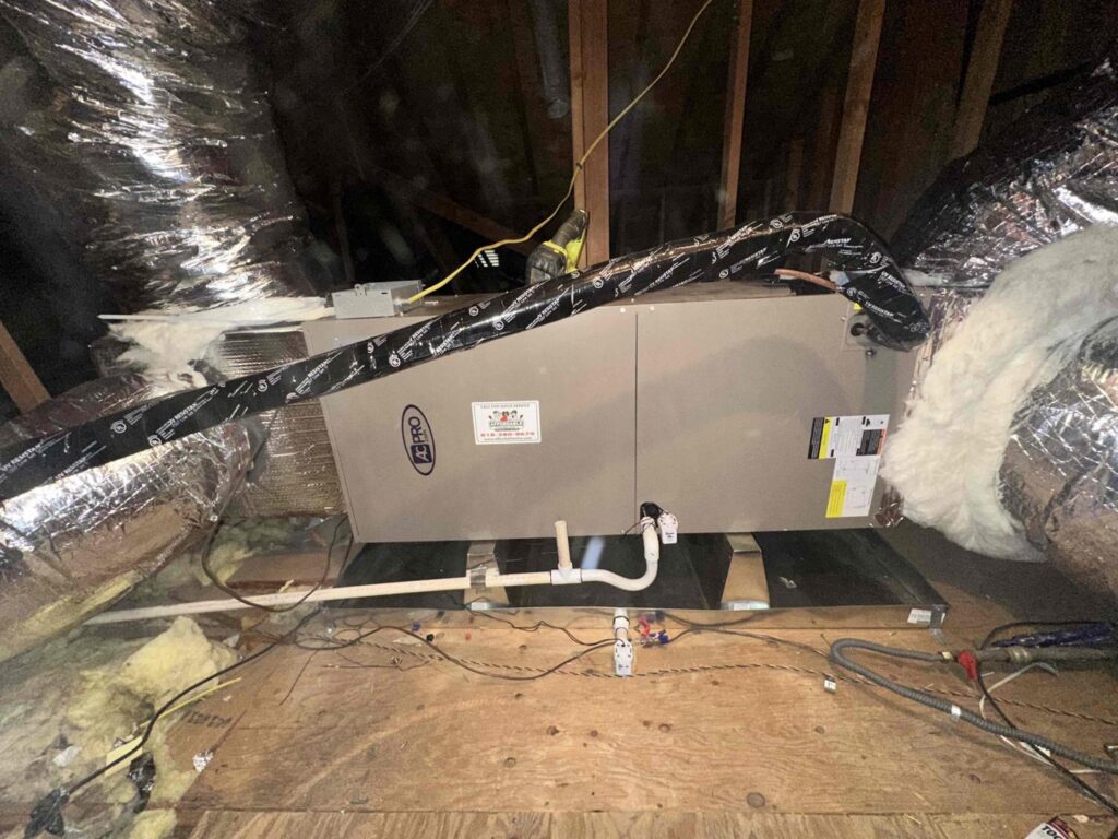 An HVAC air handler unit and ductwork installed in an attic space by Affordable Heating and Air in Chatsworth, CA.