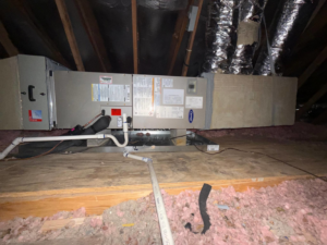 An HVAC air handler unit and ductwork installed in an attic by Competition A/C & Heat, LLC in Corpus Christi, TX