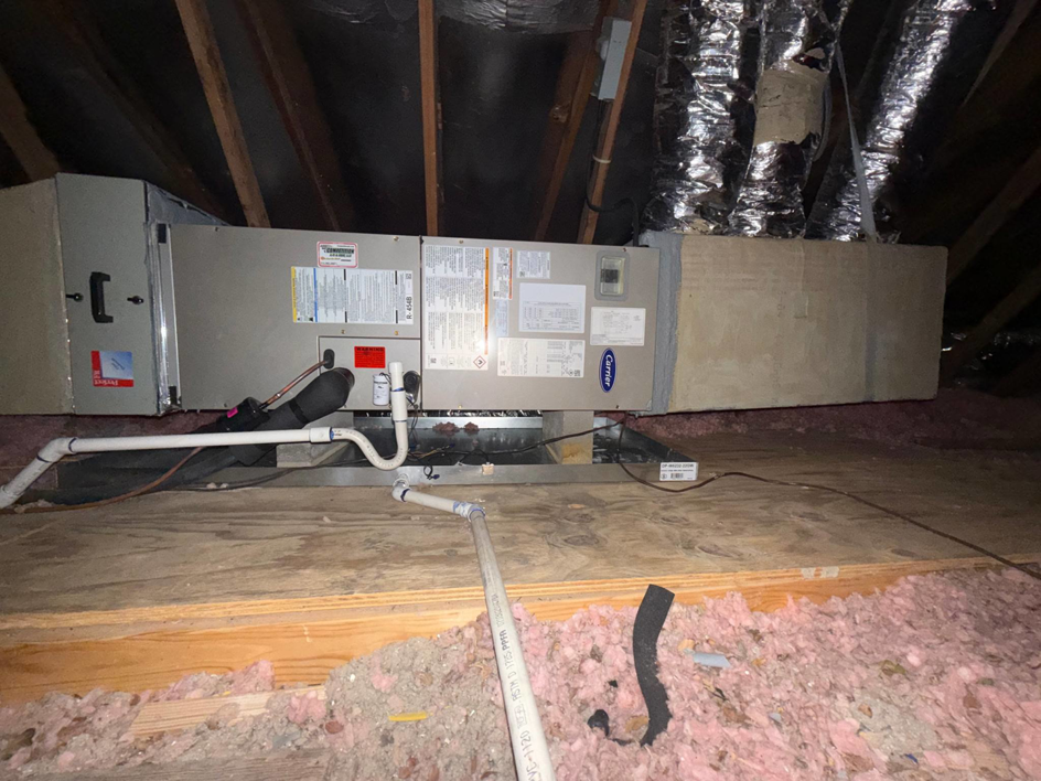 An HVAC air handler unit and ductwork installed in an attic by Competition A/C & Heat, LLC in Corpus Christi, TX