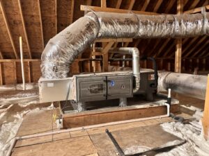 HVAC air handler and insulated ducts installed in an attic by ACE Heating & Cooling, Inc. in Jonesboro, AR