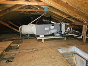 An HVAC air handler unit and insulated ductwork installed in an attic by Advance Heating & Air, Inc. in Sumter, SC.