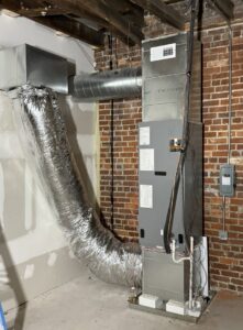Indoor HVAC air handler and ductwork installation by Infinite Comfort in Youngsville, NC.