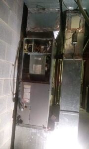 An HVAC air handler unit with connected ductwork, installed by ReDesign Air in Winchester, VA.