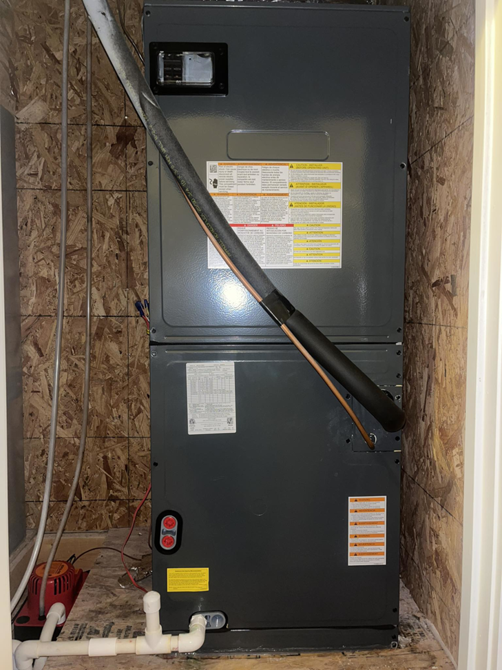 An indoor HVAC air handler unit recently installed by G & N Heating and Cooling in Huntsville, AL.
