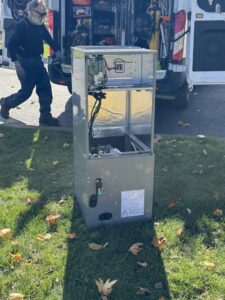 An HVAC air handler unit being prepared for installation by Comfort Systems and Solutions in Coventry, RI