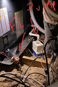 An interior view of an HVAC air handler showing internal components and wiring, indicating service work by Bama Air Systems in Cullman, AL.