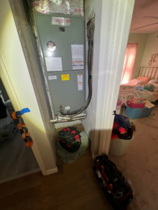 An HVAC air handler unit being serviced in a utility closet by AC All Stars AC contractor in Fort Lauderdale, FL.