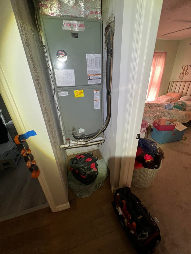 An HVAC air handler unit being serviced in a utility closet by AC All Stars AC contractor in Fort Lauderdale, FL.