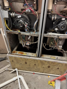 Internal components of HVAC air handler units exposed for repair or maintenance by Indoor Weather Solutions LLC in Broken Arrow, OK.