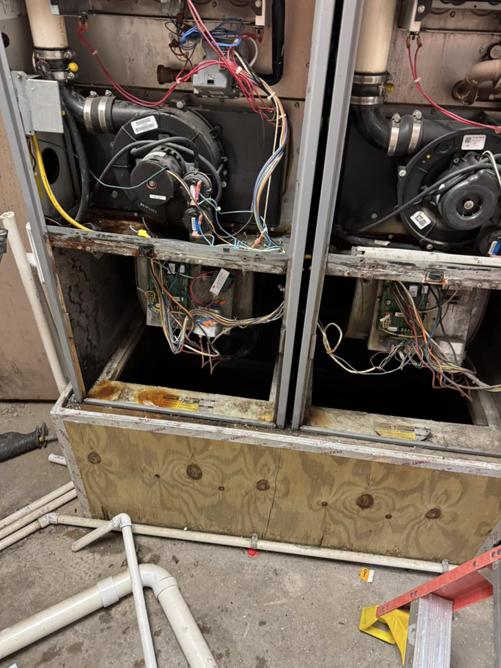 Internal components of HVAC air handler units exposed for repair or maintenance by Indoor Weather Solutions LLC in Broken Arrow, OK.