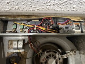 Close-up of an HVAC blower fan and electrical components during service by Direct Service HVAC & Maintenance in Lewisburg, OH.