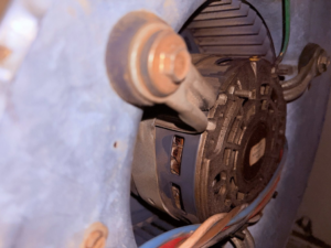 Close-up of an HVAC blower motor, indicating repair or service by JR HVAC and More LLC in Parma, OH.