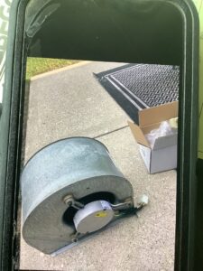 An HVAC blower motor removed for replacement or repair by Family Heating & Air Conditioning in Indianapolis, IN.