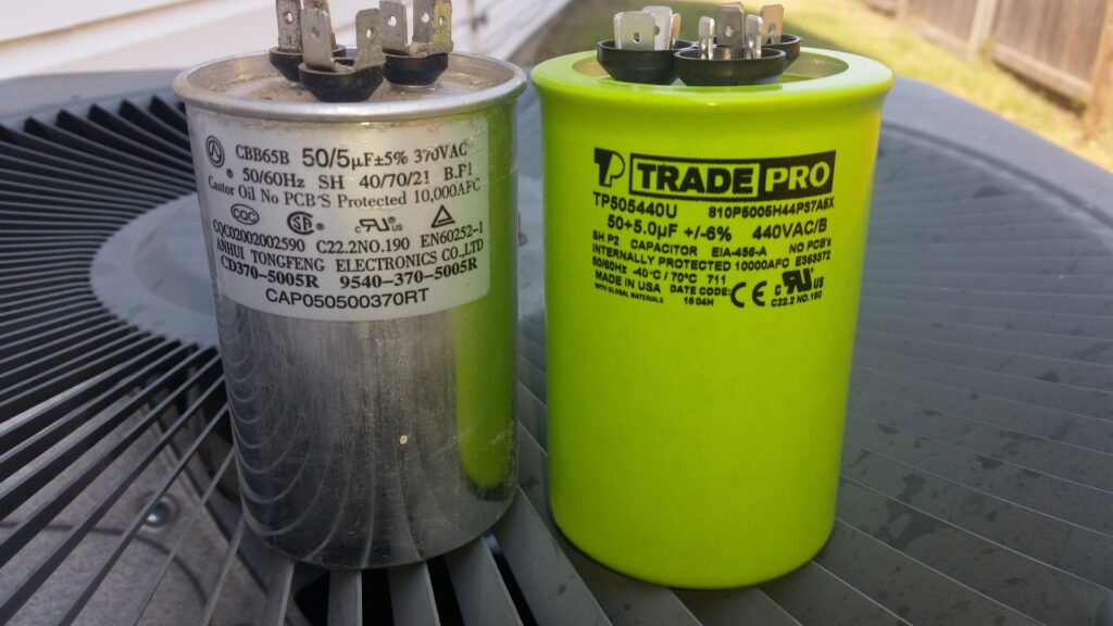 New and old HVAC capacitors for replacement by Goodpaster's Mechanical, Inc. in Broken Arrow, OK.