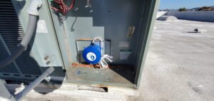 A close-up view of an internal component inside an outdoor HVAC unit being serviced by Hurn Mechanical Heating & Cooling in El Cajon, CA.