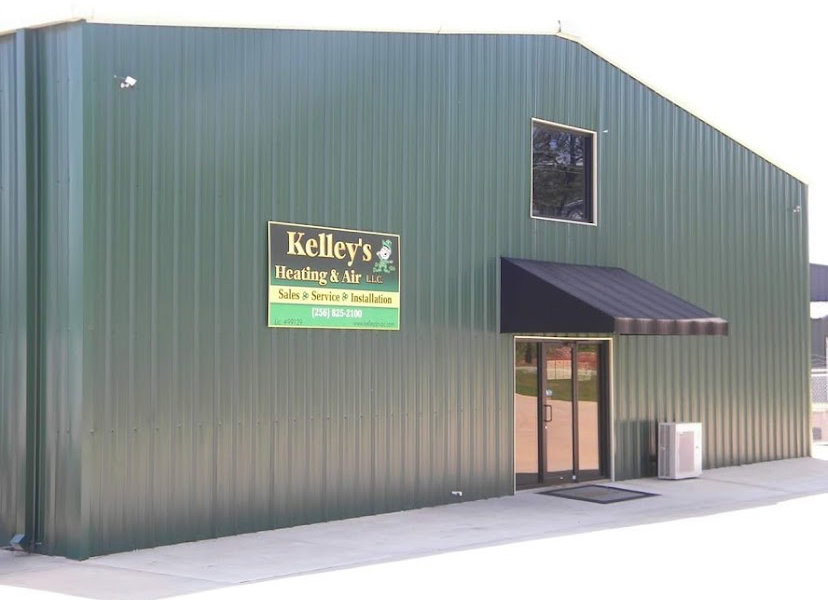An outdoor HVAC condenser unit visible next to the Kelley's Heating & Air building in Dadeville, AL