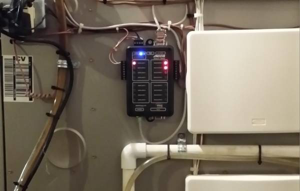 Close-up of an HVAC control panel and wiring, showcasing technical work by Elite Heating & Cooling in Knoxville, TN.