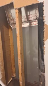 Interior view of HVAC ductwork and an air handler unit during installation or repair by Parks Heating Cooling Plumbing & Electrical in Indian Trail, NC