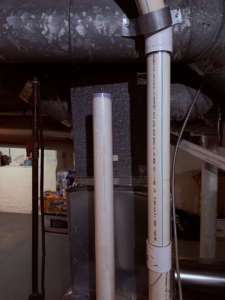 HVAC ductwork and a filter box in a basement, serviced by JR HVAC and More LLC in Parma, OH.