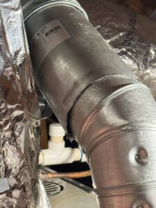 Close-up of HVAC ductwork and piping installation by C&K Air and Heating, Inc. in Olive Branch, MS.