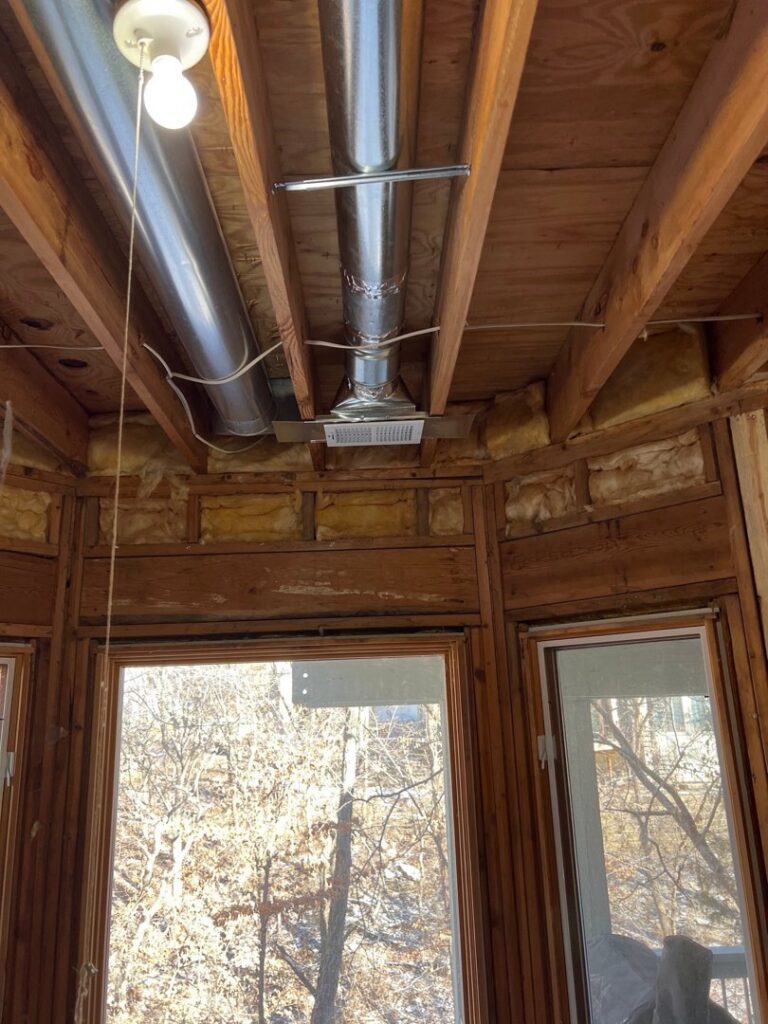 HVAC ductwork and a new vent installed in a ceiling by Spartan Mechanical KC, serving Spring Hill, KS.