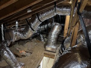 Newly installed HVAC ductwork visible in an attic by Air Support Cooling and Heating, LLC in Tampa, FL