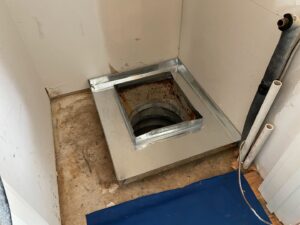 A metal ductwork base installed, preparing for a new HVAC unit by M&B Heating and Air in Charleston, SC.