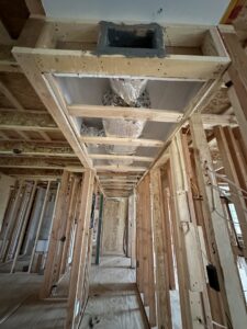 HVAC ductwork installed within a ceiling cavity during new construction by Federal Heating & Cooling in Dresden, OH.
