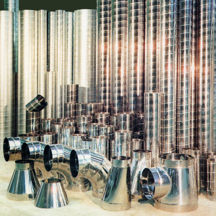 Various metal HVAC ductwork components and fittings ready for installation by DC AC Air Conditioning & Heating in San Diego, CA