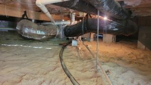 HVAC ductwork installed in a crawl space by Comfort Hounds Heating & Cooling in Raleigh, NC.