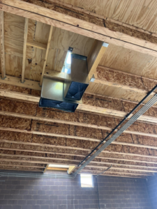 Metal HVAC ductwork extension installed in a commercial building by Airman Solutions Inc in Oklahoma City, OK