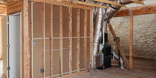 HVAC ductwork and a furnace being installed in a framed residential building by BV Air Conditioning & Heating in Dallas, TX.