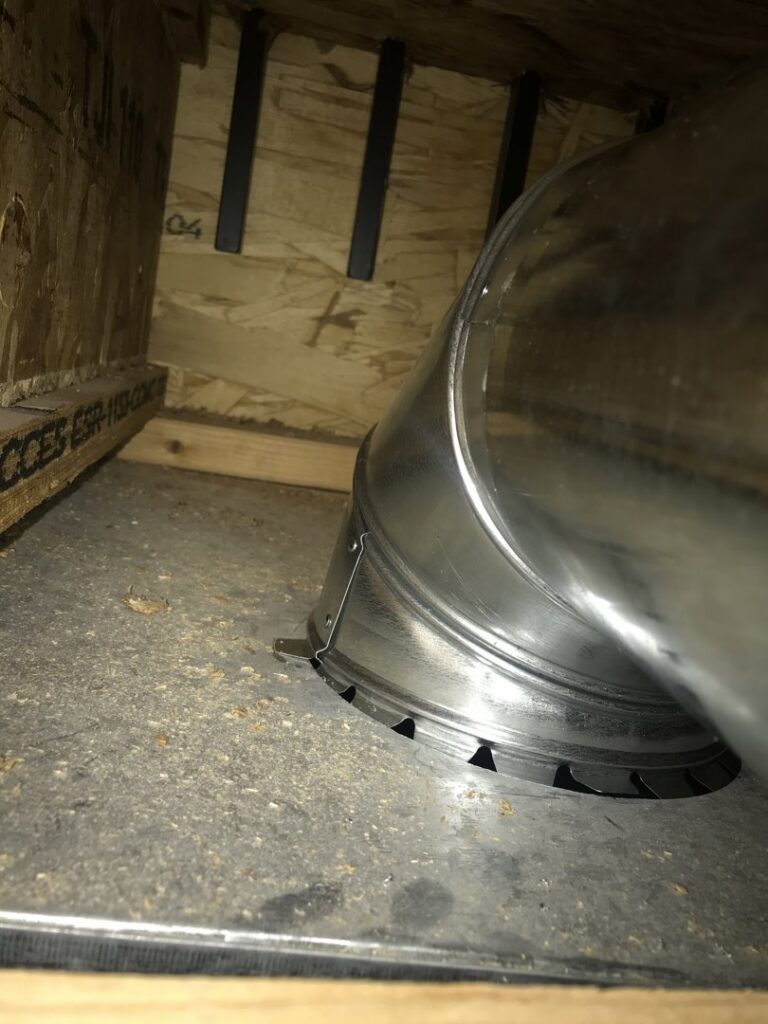 Close-up of metal HVAC ductwork being installed by Alpine Heating & Air Conditioning, Inc. in Idaho Falls, ID.