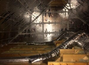 Insulated HVAC ductwork installed in an attic, showing professional work by AirHero.Pro in Lafayette, LA.