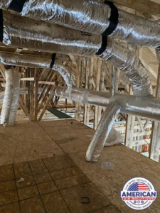 Newly installed flexible HVAC ductwork visible in an attic or unfinished space, part of an installation by American Air Solutions in Summerville, SC.