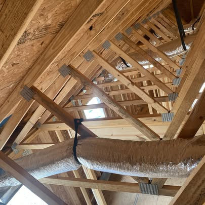 HVAC ductwork installed in an attic space by Fields Cooling Heating & Refrigeration in Foley, AL.