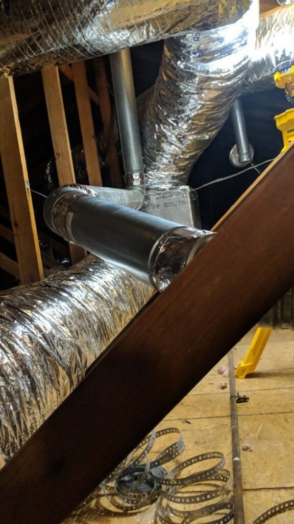 New HVAC ductwork installation in an attic by Goodpaster's Mechanical, Inc. in Broken Arrow, OK.