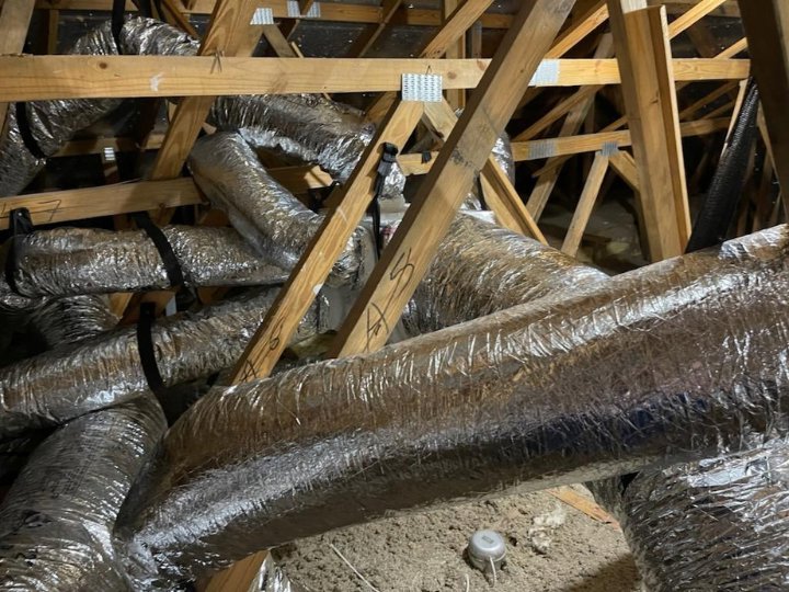 HVAC ductwork installation in an attic by J&W Heating and Air + Plumbing in Jacksonville, FL.