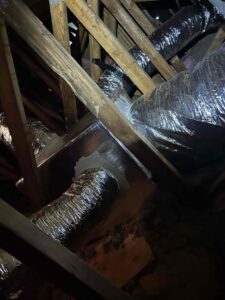 Newly installed HVAC ductwork in an attic space by Manuel & Sons Service Co. in San Antonio, TX.