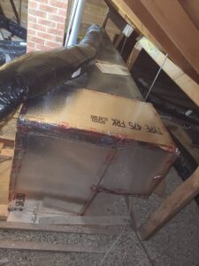 HVAC ductwork installation in an attic space by Rural Heating and Cooling Systems in Roundup, MT.
