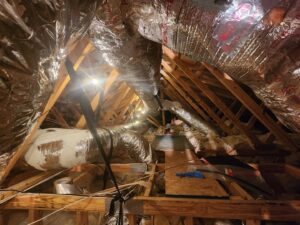 Extensive HVAC ductwork installation and insulation visible in an attic by Seven Level Services Inc in Cape Coral, FL.