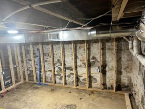 New HVAC ductwork being installed in a basement under construction by J & J Heating and Cooling, Inc. in Lancaster, PA.
