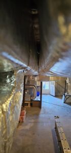 Insulated HVAC ductwork installation in a basement view by Ultra Installs in Barrington, NH