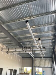 Newly installed HVAC ductwork in a commercial building by Norway Air Conditioning Inc. in Laredo, TX.